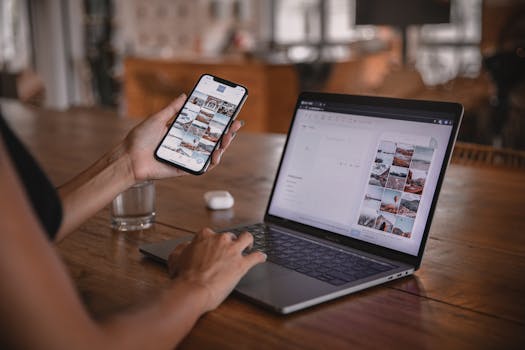 [IMAGE ALT: Woman edits social media content on growin his account using Pinterest marketing strategies.]